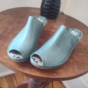 Fly London Wony Peep Toe Mules In Green